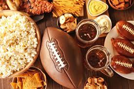 Mark Roemer image of a football party table set with all the snacks you will need this year