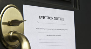 Mark Roemer image of an eviction notice on a door