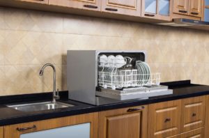 Mark Roemer Oakland image of a countertop dishwasher made for a tiny apartment.